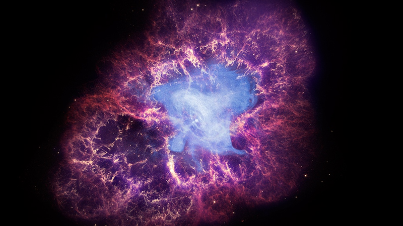 A composite image of the Crab Nebula and its pulsar, the bright dot at the center (Image: X-ray: NASA/CXC/SAO/F.Seward; Optical: NASA/ESA/ASU/J.Hester & A.Loll; Infrared: NASA/JPL-Caltech/Univ. Minn./R.Gehrz)